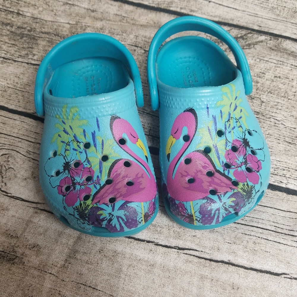 Girl's Size 5 Blue Crocs With Flamingos.